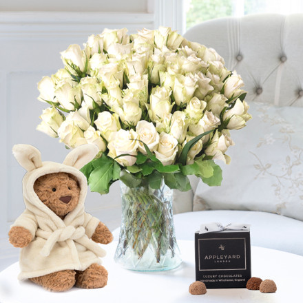 50 White Roses, Jellycat Bartholomew Bear Bathrobe (26cm) & 12 Appleyard Truffles