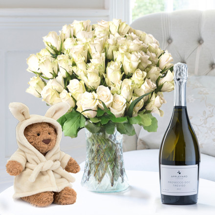 50 White Roses, Jellycat Bartholomew Bear Bathrobe (26cm) & Appleyard Prosecco (75cl)