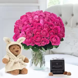 50 Pink Roses, Jellycat Bartholomew Bear Bathrobe (26cm) & 12 Appleyard Truffles